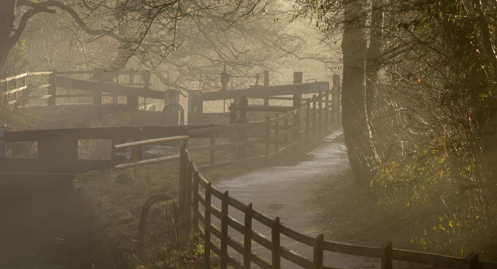 a sepia-tinged image of lock gates in the mist (copyright Tracy Onions) Misty Morning